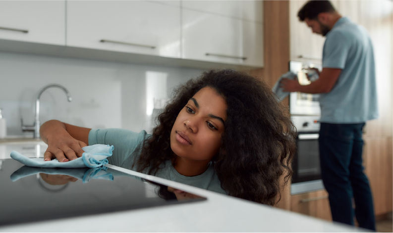 Woman Cleaning Surface