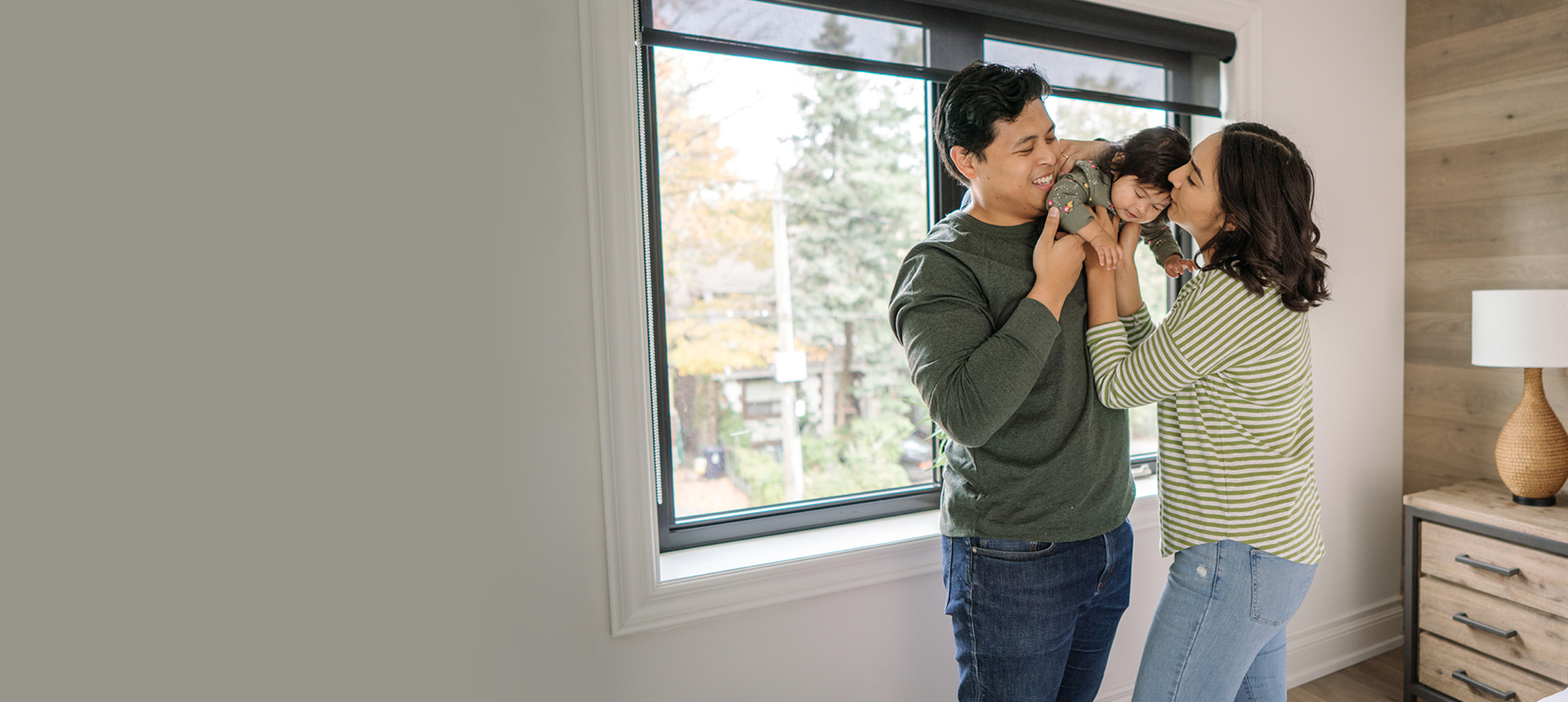 Happy Family in Bedroom