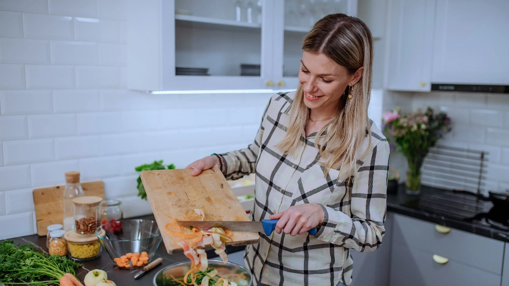 Woman Cooking a Healthy Meal at Home