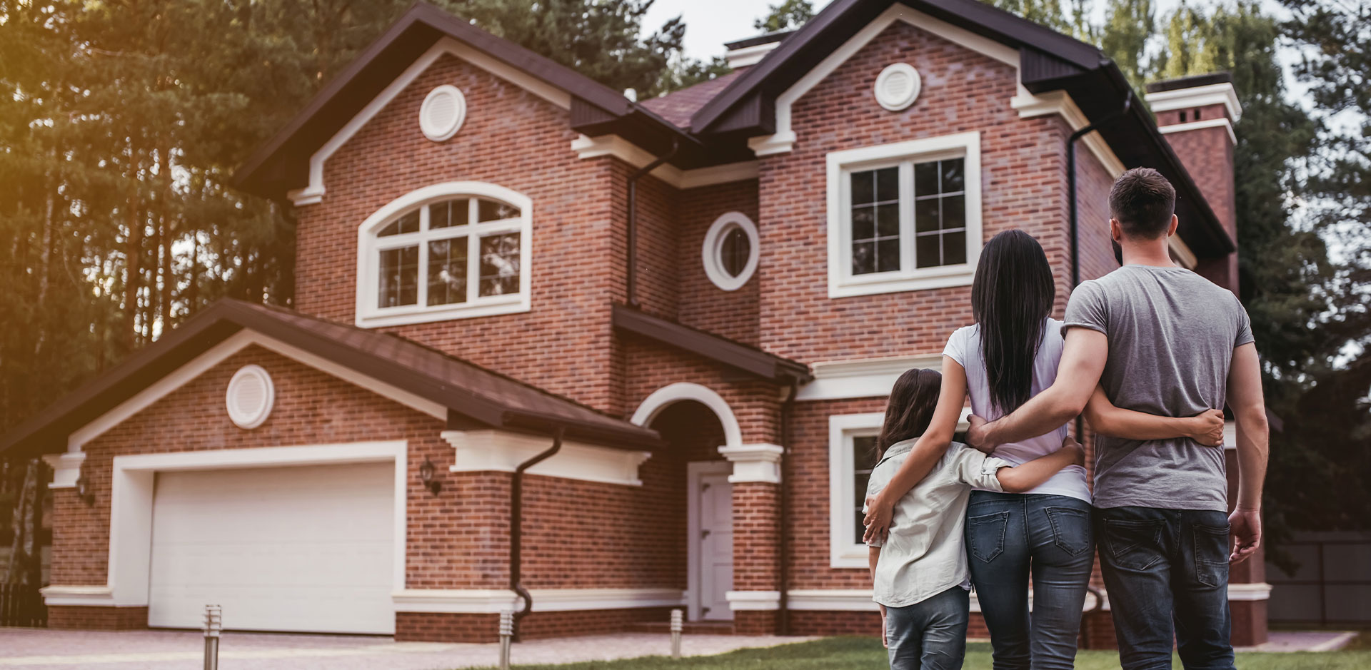 Whole House Radon Mitigation Family Outside Home