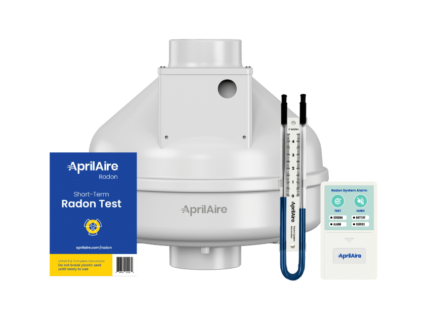 AprilAire radon mitigation kit featuring a fan, short-term test packet, U-tube manometer, and digital system alarm.