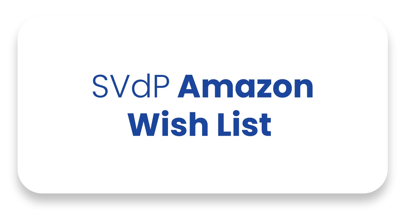 White rectangular banner with rounded corners featuring the blue text "SVdP Amazon Wish List".