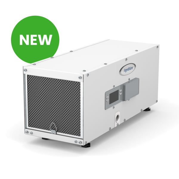 Small-format white dehumidifier with a large mesh air intake, digital screen, and a green 