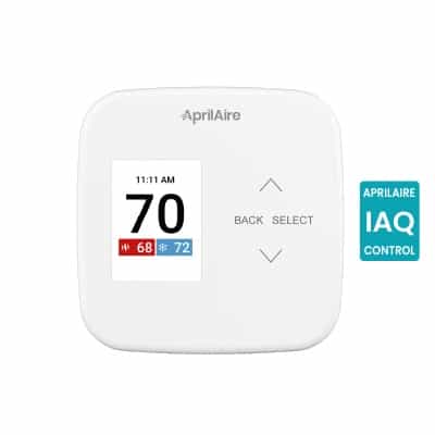 A modern white AprilAire thermostat with a color display, touch navigation arrows, and an IAQ Control badge.