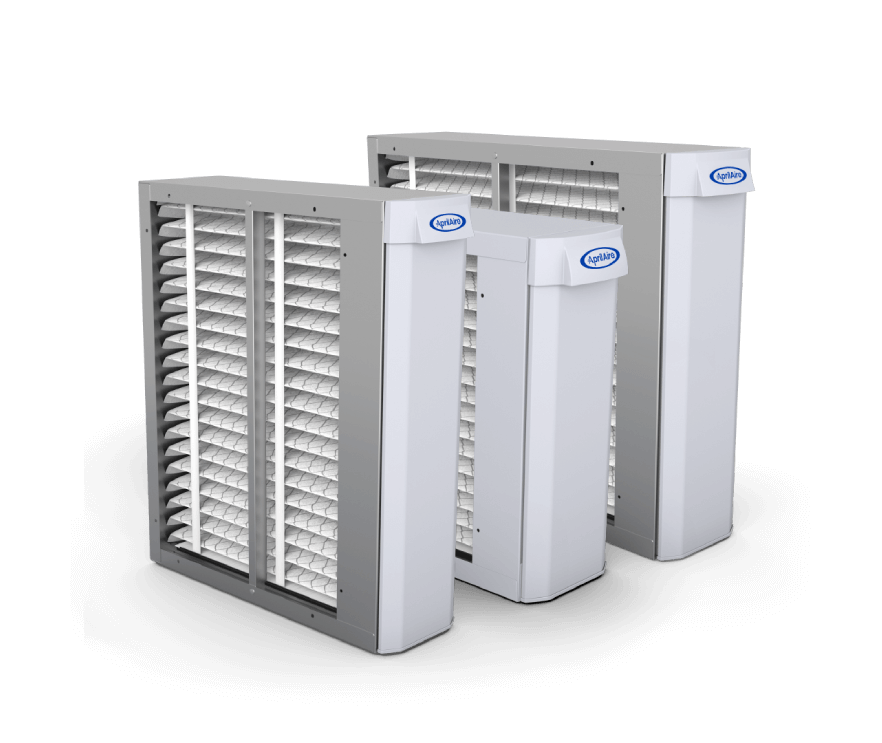 Three various sized AprilAire whole-home air cleaners with pleated filters in a clean white studio setting.